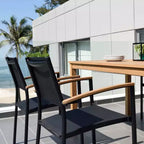Set da pranzo rettangolare allungabile da patio Amazonia Lapa 7 pezzi in alluminio e legno con finitura in teak 100% nero
