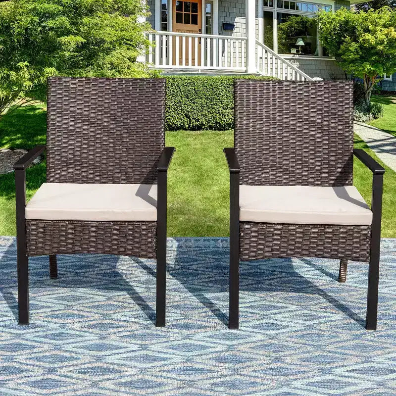 Set da pranzo per esterni 7 pezzi: tavolo in acciaio, sedie in vimini, cuscini - Captiva Designs
