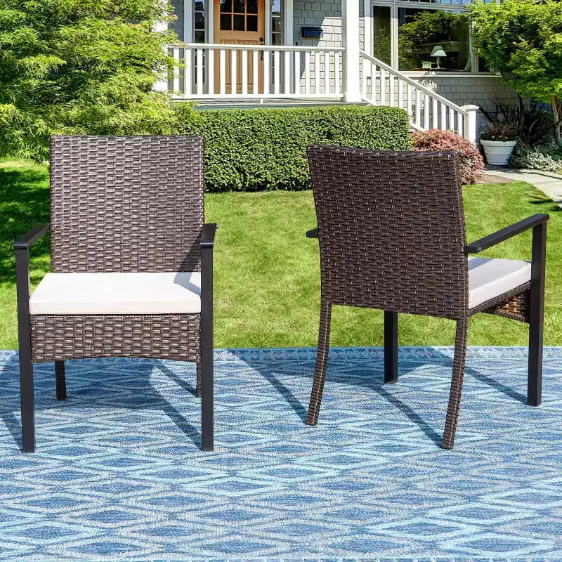 Set da pranzo per esterni 7 pezzi: tavolo in acciaio, sedie in vimini, cuscini - Captiva Designs