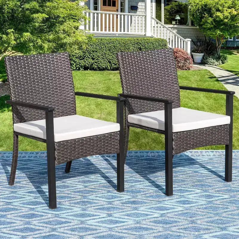 Set da pranzo per esterni 7 pezzi: tavolo in acciaio, sedie in vimini, cuscini - Captiva Designs