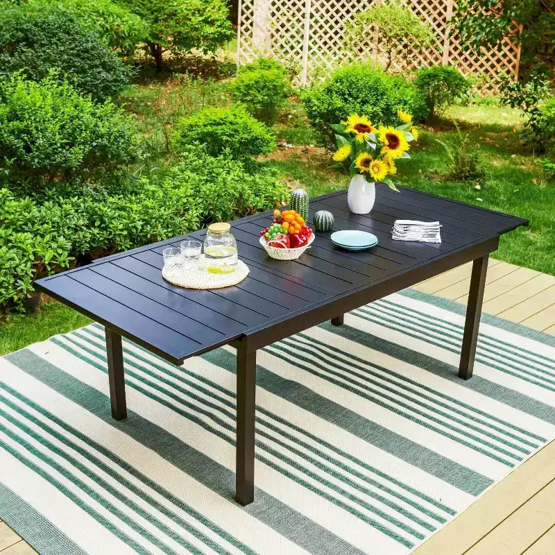 Set da patio da 9 pezzi con tavolo allungabile in acciaio e sedie a fionda impilabili - Captiva Designs: Sala da pranzo all'aperto, resistente alle intemperie