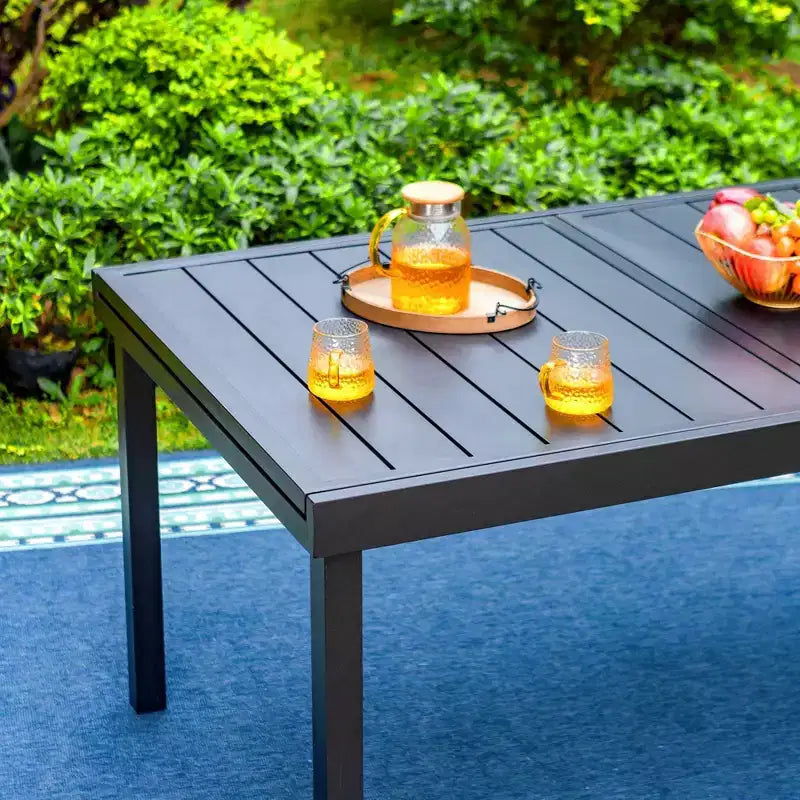 Set da pranzo da patio da 9 pezzi con tavolo in acciaio allungabile e poltrone imbottite - Captiva Designs: Set di mobili da esterno resistenti alle intemperie