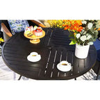 Set da pranzo da esterno 5 pezzi con sedie in vimini con cuscini e tavolo rotondo in metallo con foro per ombrellone - Blu - Captiva Designs
