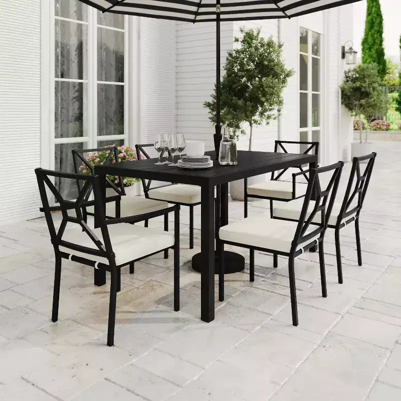 Set da pranzo da esterno Martha Stewart in acciaio da 7 pezzi con 6 sedie impilabili e tavolo da 62 pollici in nero