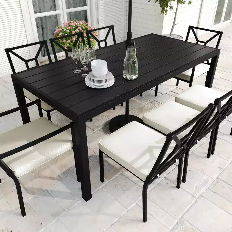 Set da pranzo da esterno Martha Stewart da 9 pezzi in acciaio con 8 sedie impilabili e tavolo da 71 pollici, nero