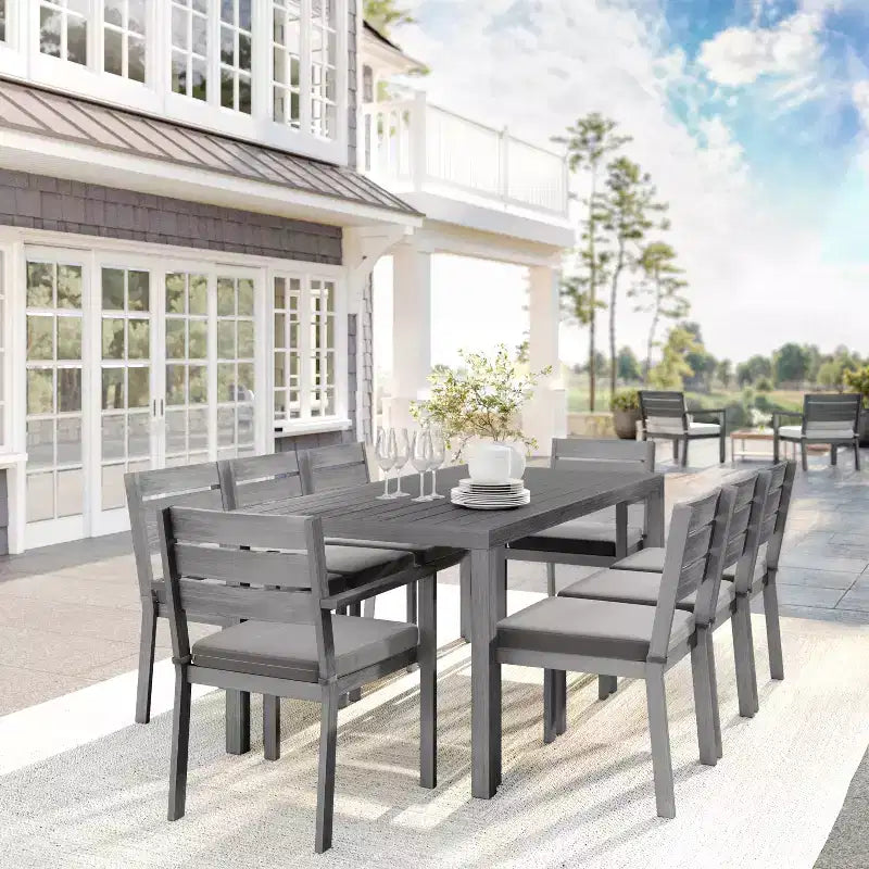 Set da patio Martha Stewart Bedford per interni-esterni con tavolo da 71 pollici e 8 sedie da pranzo con finitura in alluminio spazzolato effetto legno e cuscini per seduta resistenti alle intemperie