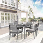 Set da patio Martha Stewart Bedford per interni ed esterni con tavolo da 62 pollici e 6 sedie da pranzo con finitura in alluminio spazzolato effetto legno e cuscino di seduta per tutte le stagioni