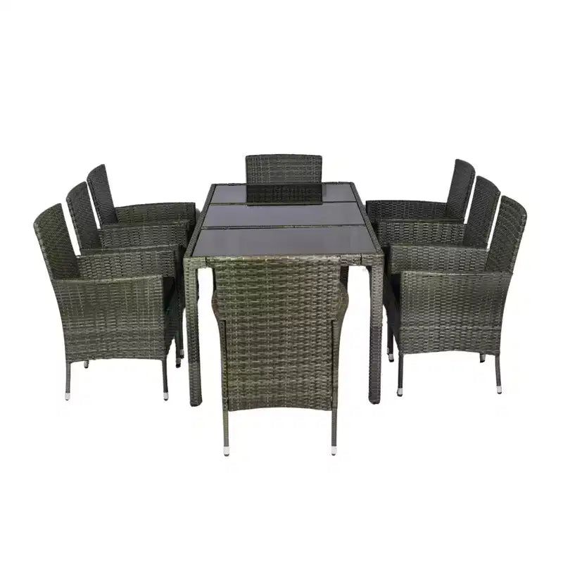 Set da pranzo da esterno Whisen a 9 pezzi in vimini con piano in vetro