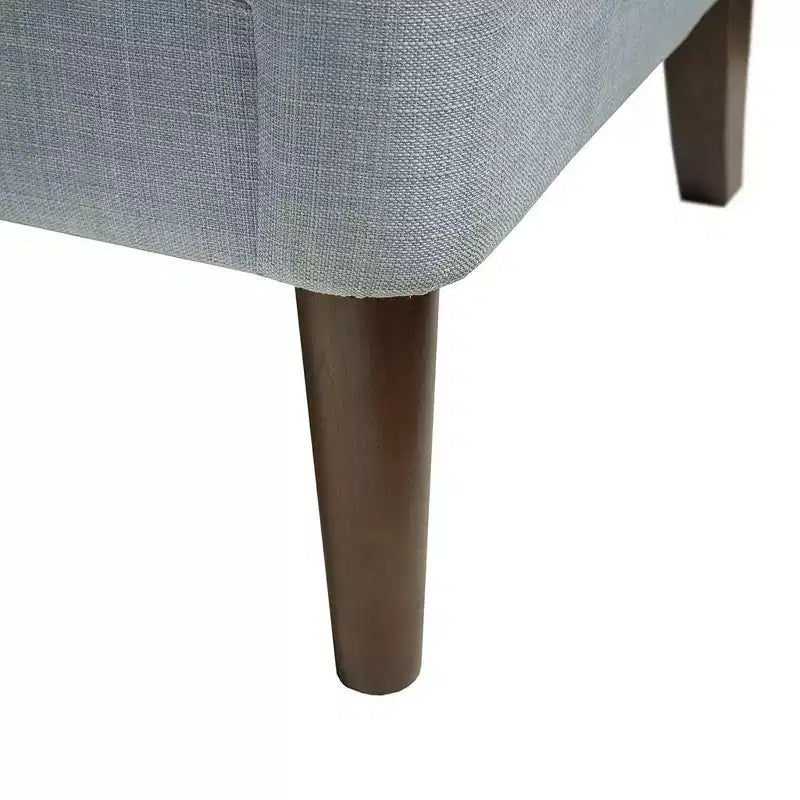 Poltrona d'accento contemporanea con bottoni trapuntati, sedia da salotto con cuscino imbottito, comoda poltrona con gambe in legno