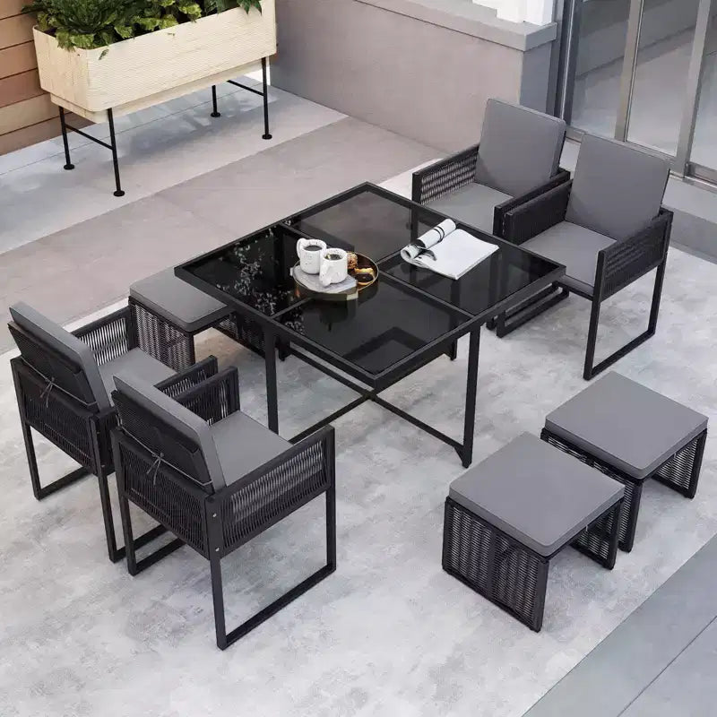 Costway Ensemble de salle à manger 9 pièces pour terrasse avec chaises en rotin PE, table en verre trempé et poufs