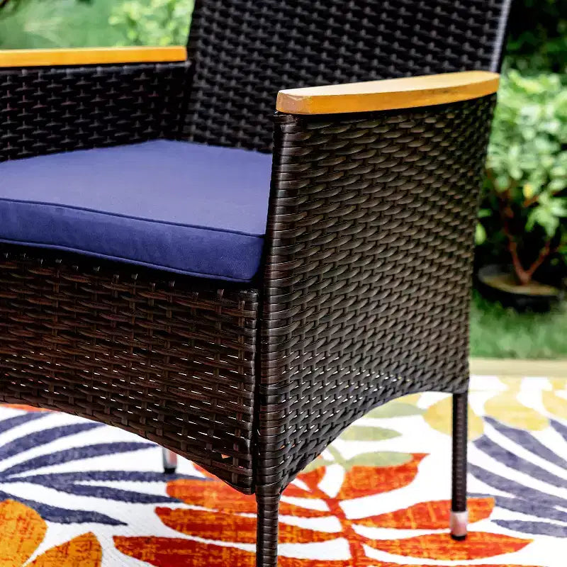 Captiva Designs Set da pranzo da 7 pezzi per esterni con tavolo in acciaio con ripiano a doghe e sedie in rattan con cuscini rimovibili