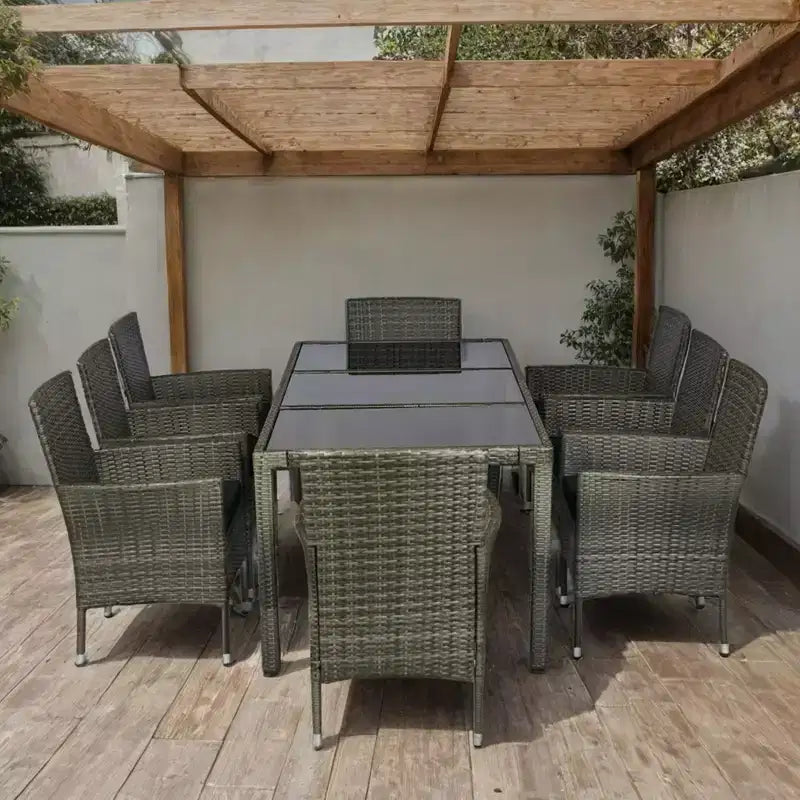 Set da pranzo da esterni GDFStudio Jayu Moderno a 9 pezzi in metallo e rattan sintetico con cuscino e tavolo con piano in vetro