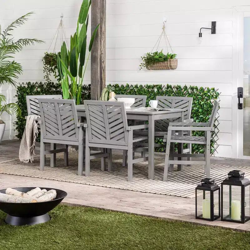 Set da pranzo da esterno Saracina Home a 7 pezzi con motivo a chevron in acacia e doghe