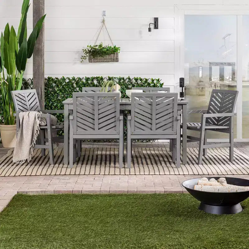 Set da pranzo da esterno Saracina Home a 7 pezzi con motivo a chevron in acacia e doghe