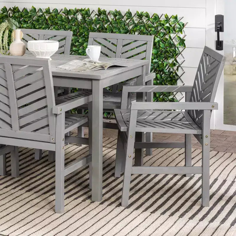 Set da pranzo da esterno Saracina Home a 7 pezzi con motivo a chevron in acacia e doghe