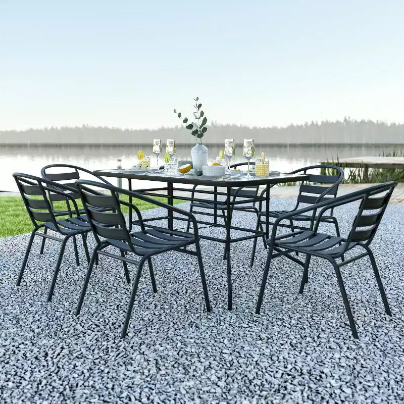 Set Emma and Oliver di tavolo e sedie da patio da 7 pezzi con tavolo rettangolare in metallo 80x140 cm con piano in vetro temperato e 6 sedie impilabili in alluminio nere