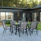 Set da patio sette pezzi Emma and Oliver con tavolo in metallo con piano in vetro temperato e 6 sedie impilabili Flex Comfort