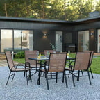 Set da patio sette pezzi Emma and Oliver con tavolo in metallo con piano in vetro temperato e 6 sedie impilabili Flex Comfort