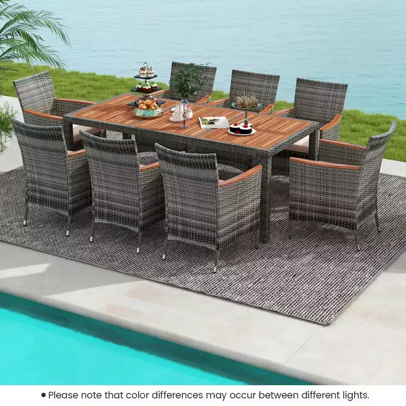 Set da pranzo da esterno in vimini a 9 pezzi Costway con tavolo in legno di acacia e 8 poltrone