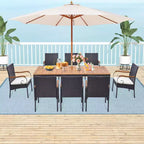 Set da Pranzo Costway 9 Pezzi in Rattan da Esterno con Tavolo in Legno di Acacia, Cuscini, Foro per Ombrellone da 1,9
