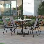 Set da pranzo da esterno 5 pezzi Emma e Oliver con tavolo da patio con ripiano in vetro temperato e 4 sedie impilabili in Textilene Flex Comfort