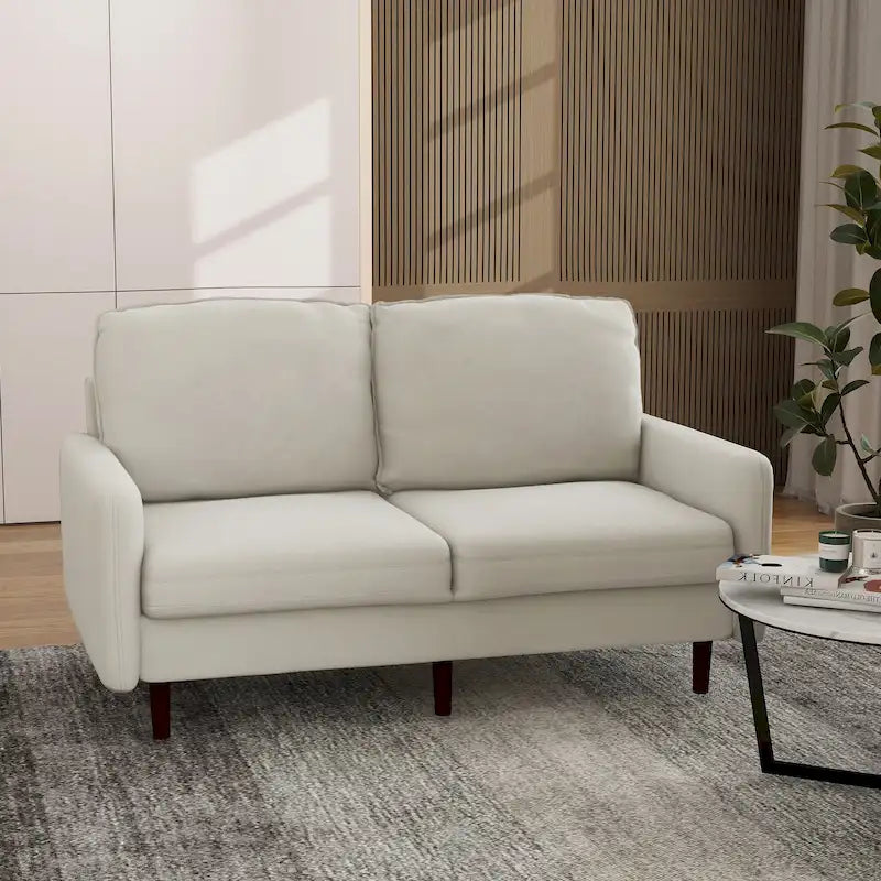 Divanetto moderno in velluto con gambe in legno
