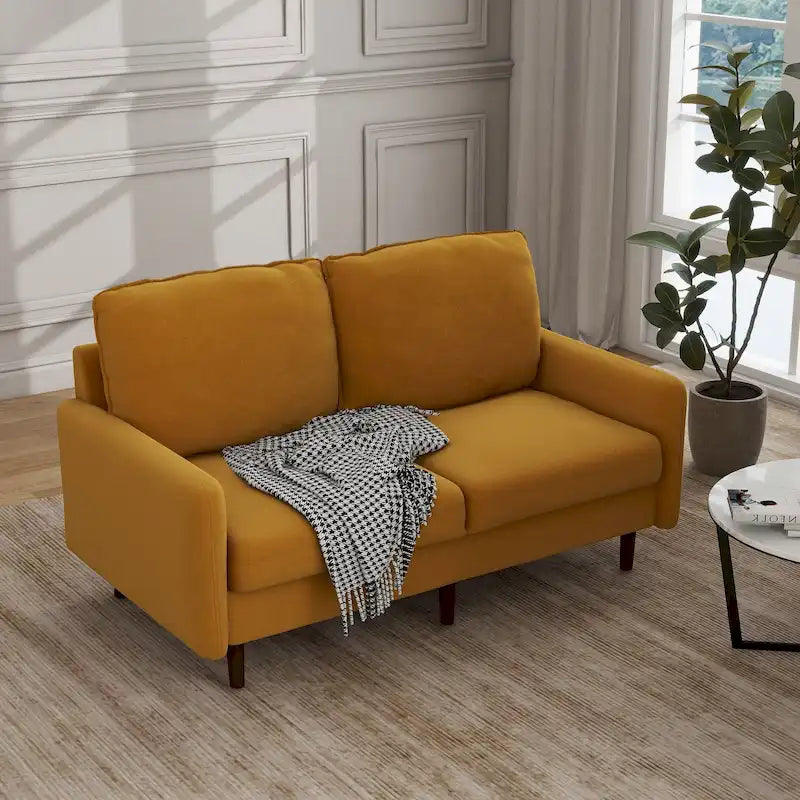 Divanetto moderno in velluto con gambe in legno
