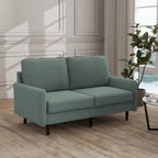 Divanetto moderno in velluto con gambe in legno