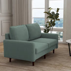 Divanetto moderno in velluto con gambe in legno