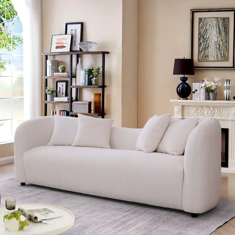 Divano Hanar in bouclé con schienale curvo e design moderno di lusso di metà secolo