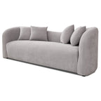 Divano Hanar in bouclé con schienale curvo e design moderno di lusso di metà secolo
