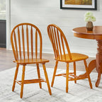 Sedie da pranzo Simple Living Carolina in legno massello con schienale a fusi (set da 2)