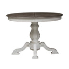 Table à dîner ronde sur pied Magnolia Manor avec rallonges escamotables - 2 finitions