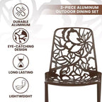 LeisureMod Devon Set da pranzo da esterno in alluminio a 3 pezzi con tavolo con piano in vetro temperato e 2 sedie impilabili con design floreale