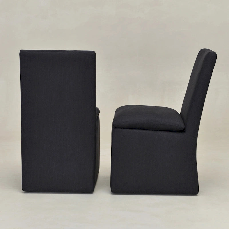 Sedia da pranzo laterale KINWELL 21 imbottita in tessuto performante con ruote (set da 2)