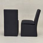 Sedia da pranzo laterale KINWELL 21 imbottita in tessuto performante con ruote (set da 2)