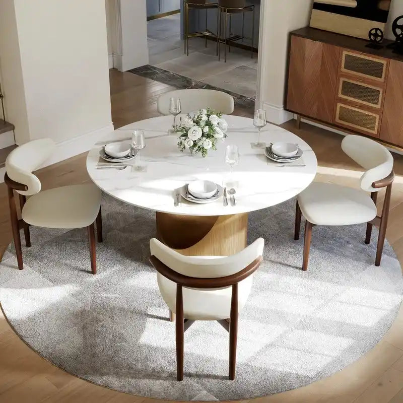 Tavolo da pranzo moderno rotondo per sala da pranzoPiano in pietra lucida bianca, piedistallo in carbonio bronzo