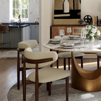 Tavolo da pranzo moderno rotondo per sala da pranzoPiano in pietra lucida bianca, piedistallo in carbonio bronzo