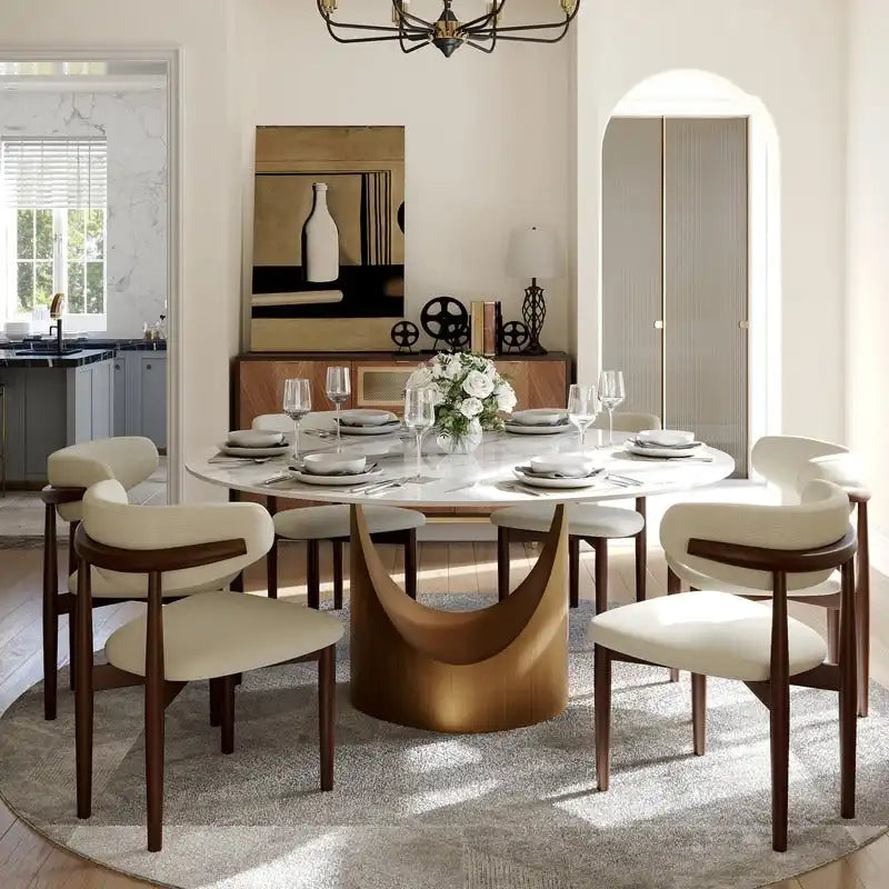 Tavolo da pranzo moderno rotondo per sala da pranzoPiano in pietra lucida bianca, piedistallo in carbonio bronzo