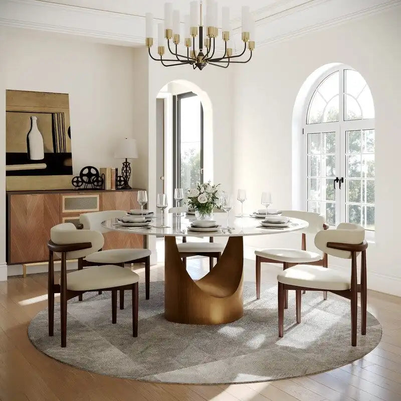 Tavolo da pranzo moderno rotondo per sala da pranzoPiano in pietra lucida bianca, piedistallo in carbonio bronzo