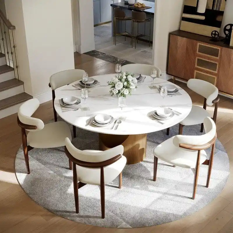 Tavolo da pranzo moderno rotondo per sala da pranzoPiano in pietra lucida bianca, piedistallo in carbonio bronzo