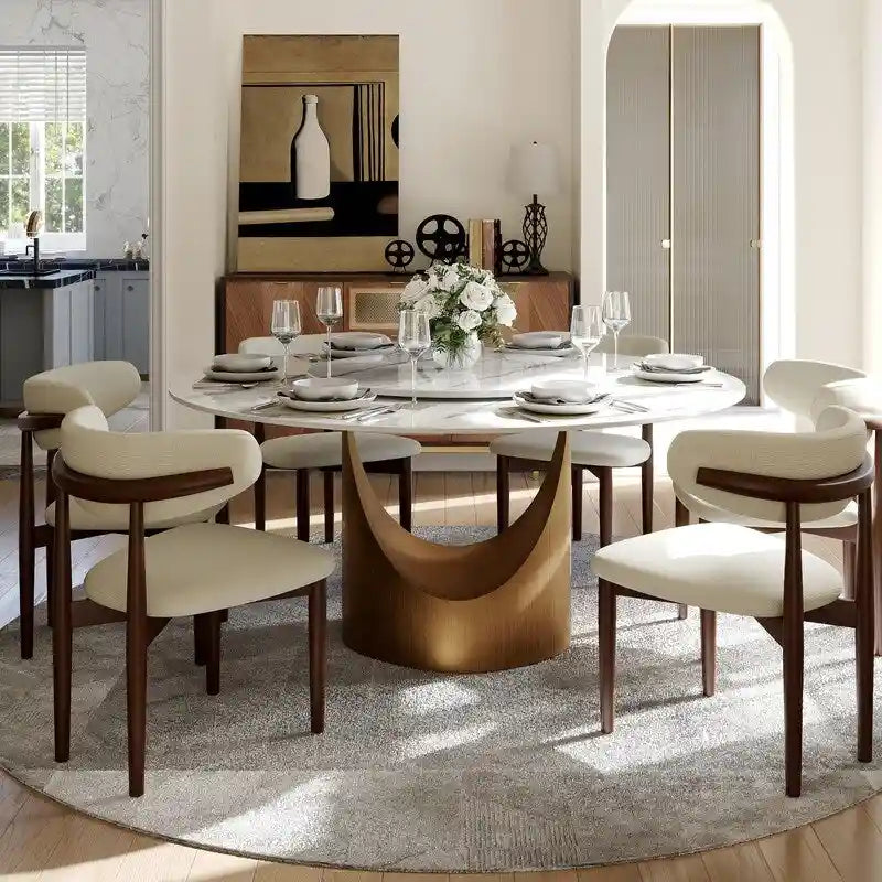 Tavolo da pranzo moderno rotondo per sala da pranzoPiano in pietra lucida bianca, piedistallo in carbonio bronzo
