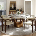 Tavolo da pranzo moderno rotondo per sala da pranzoPiano in pietra lucida bianca, piedistallo in carbonio bronzo