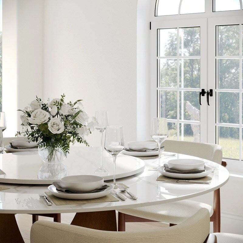 Tavolo da pranzo moderno rotondo per sala da pranzoPiano in pietra lucida bianca, piedistallo in carbonio bronzo