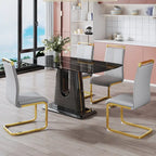 Tavolo da pranzo. Piano con motivo in finto marmo nero. Gambe in MDF nero, linee oro, base nera