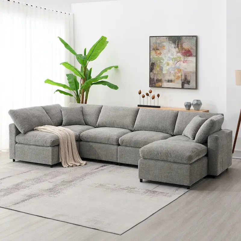 Divano letto componibile a U in ciniglia con pouf